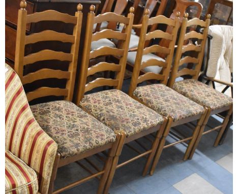 A Set of Four Upholstered Ladder Back Dining Chairs 