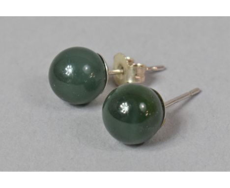 A Pair of Jade and Silver Stud Earrings 