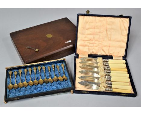 A Set of Gilt Teaspoons in N. Friederich and Co Jeweller, Gold and Silversmiths, (Case Af) together with a Cased Fish Knife a