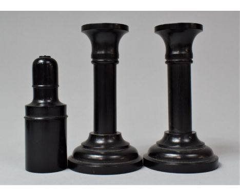 A Pair of Turned Ebony Candlesticks, 13cm high Together with an Ebony Cylindrical Box Containing Glass Flask with Stopper, 10