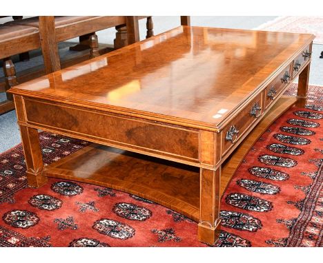 A burr walnut, featherbanded and crossbanded coffee table, retailed by Barker &amp; Stonehouse, modern, of rectangular form w