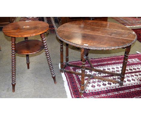 A 1920's oak gateleg table with lunette carved frieze, 90cm by 92cm (open) by 63cm, together with a bobbin turned two-tier oc