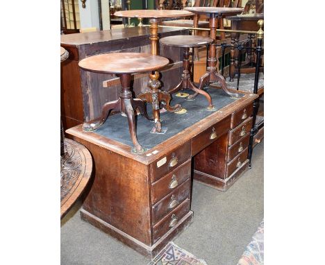 A Victorian mahogany leather inset twin pedestal desk, 150cm by 72cm by 75cm, together with two Georgian mahogany tripod tabl
