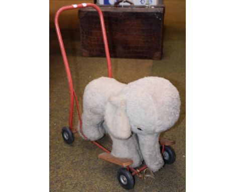 A pull-a-long Elephant by Pedigree Soft Toys Limited, together with a quantity of other soft toys, including hand puppet, moh