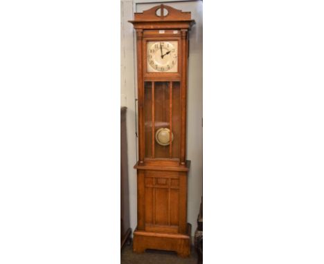 An Art Deco oak longcase clock, 11.5'' silvered Arabic numeral dial, 201cm high