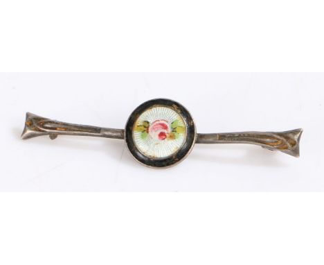 Silver and enamel bar brooch with a central circle depicting a rose on a white background with a black border, 5cm long&nbsp;