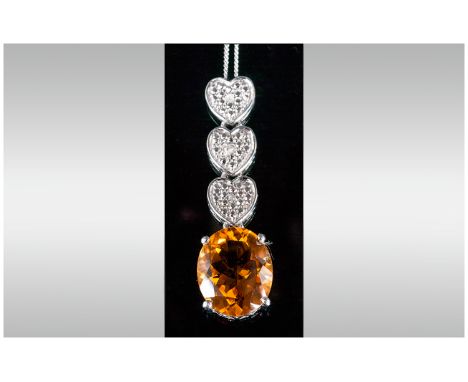 Madeira Citrine Pendant Drop on chain, a 4ct oval cut Madeira citrine set below a platinum vermeil and silver bale comprising