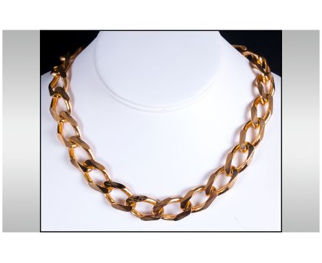 Christian Dior Vintage and Top Quality Gold Tone Necklace. c.1980's. The Necklace Is Finished with Signature Double Clip Clas
