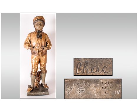 19th Century Gilded Terracotta Goldscheider Figure Of A Boy, in fur hat and breeches with his hands in his pockets, various m