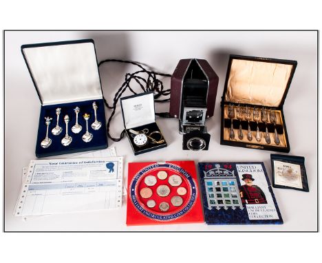 Assorted Collectables including United Kingdom Coin Sets, cased dessert forks, Voigtlander Projector etc