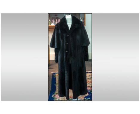 Dark Chocolate Brown Full Length Luxurious Mink Coat, glossy and supple, with an unusual sleeve detail; self lined collar wit