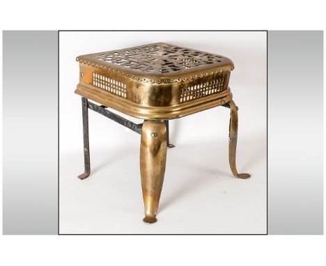 Antique Brass Fender Stool on a Cast Iron Support. 13.5 Inches High, 12 Inches Wide. 
