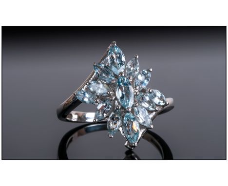 Brazilian Aquamarine Cluster Ring, a cluster of marquise cut aquamarines, in a diamond shape, with a further marquise cut to 