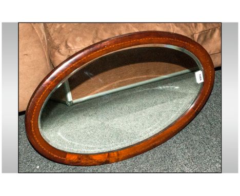 Oval Mirror With Wood Surround And String Inlay - Approx 26x16 inches. Bevelled glass.