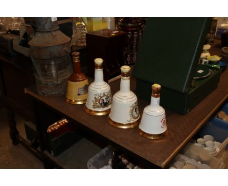 Four Wade Bells Scotch whisky decanters with contents