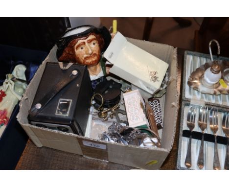 A box containing a box Brownie camera, character jug, compass etc.