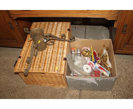 A Christmas tree stand, various Christmas tree decorations and a wicker hamper 