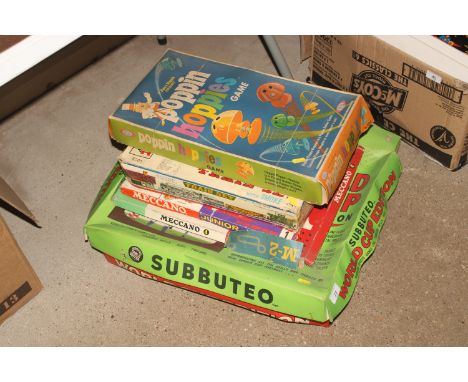 A collection of vintage games to include Subbuteo World Cup edition, Meccano, and battery operated train set