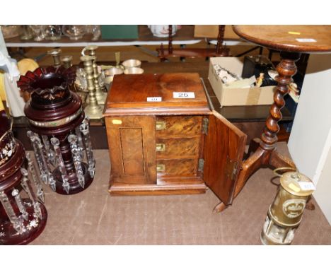 A walnut table top cabinet, interior fitted three drawers with key