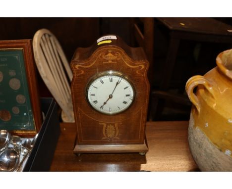 An Edwardian mahogany and boxwood strung mantel clock 