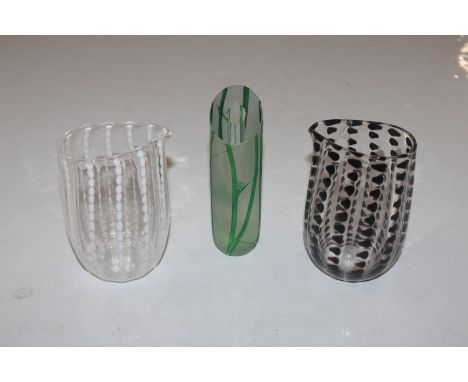 K. Coleman, Art Glass posy vase, signed and dated to base 2005, 14.5cm high (chip to top rim); and two Studio Art Glass jugs,