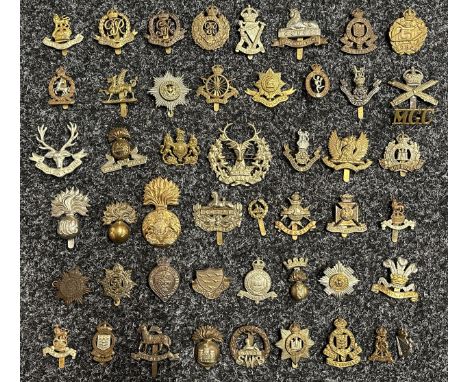 Collection of British Army Cap badges to include: Military Foot Police: Military Police x 2: WW1 RE: RAOC: WW1 Tank Corps: Li
