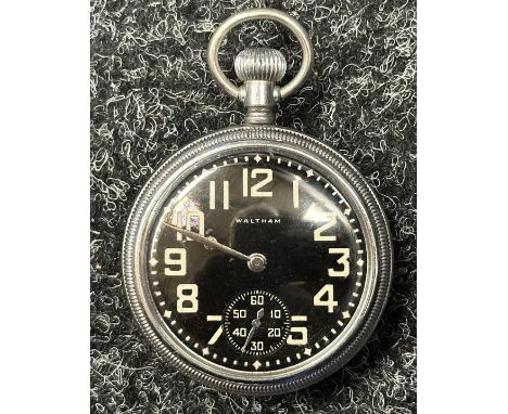 WW2 British Pocket Watch by Waltham with black enamel dial with Arabic numerals, separate seconds dial. Reverse of case marke