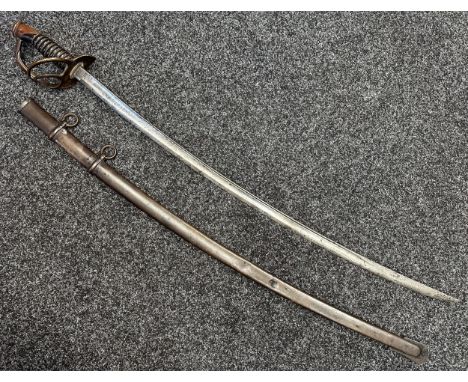 US Civil War 1861 Pattern Cavalry Officers Sword with single edged fullered blade 874mm in length, marked "US 1861". Brass gu