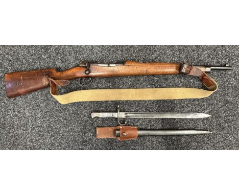 Section 1 Firearm: Mauser M1896 Carbine in 7mm x 57 cal by Deutsche Waffen- und Munitionsfabriken. Serial Number 5245. Barrel