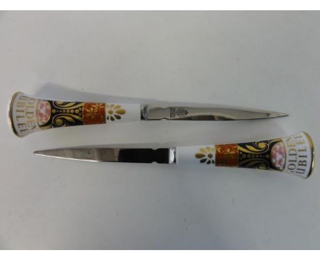 A pair of Royal Worcester paper knives 