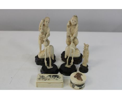 A shelf of assorted antique bone &amp; ivory carved figures 