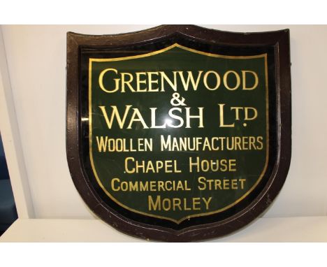 A vintage Greenwood &amp; Walsh Ltd of Morley, glass &amp; wooden framed shield sign. 70cm x 68cm collection only 