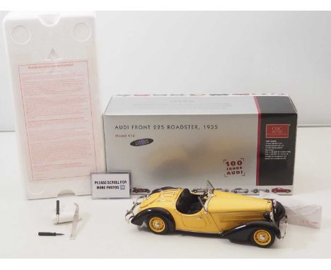 A CMC M-075A 1/18 scale diecast Audi Front 225 Roadster touring car 1935 "100 Years of Audi" Limited Edition, yellow/black, w