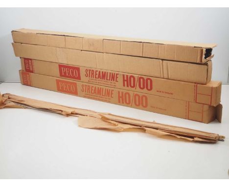 A large quantity of OO gauge flexible track and track components comprising 2x boxes of PECO SL-100 code 100 flexitrack (appe