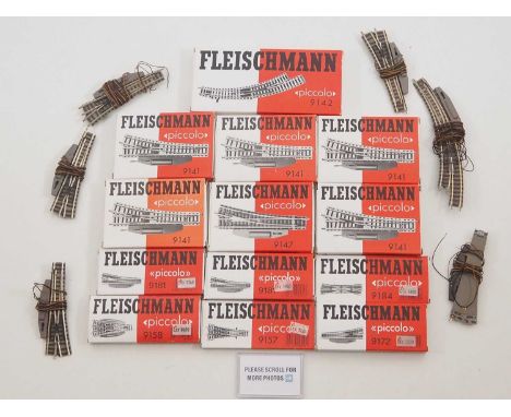 A group of FLEISCHMANN N gauge Piccolo boxed and unboxed points, mostly electric versions fitted with motors - VG in G/VG box