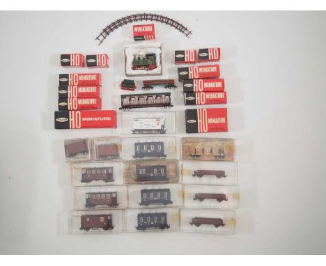 A quantity of JOUEF / EGGERBAHN HOe scale rolling stock and accessories including a Decauville steam loco and various boxed w