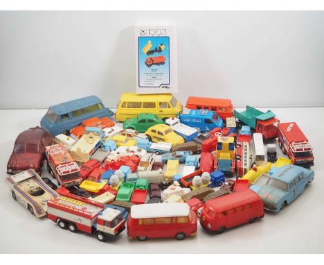 A large roundabout of vintage plastic cars and trucks mostly Eastern European/Czechoslovakian - F/G (unboxed) (Q)