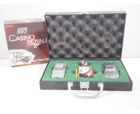 A CORGI 1:36 scale diecast Limited Edition James Bond Casino Royale Aston Martin DB5 & DBS mini briefcase set CC99194 - Signe