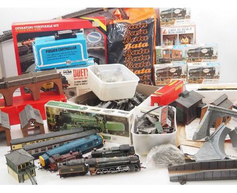 A large group of OO gauge model railway rolling stock, controllers, buildings and other accessories - F/G in F/G boxes where 