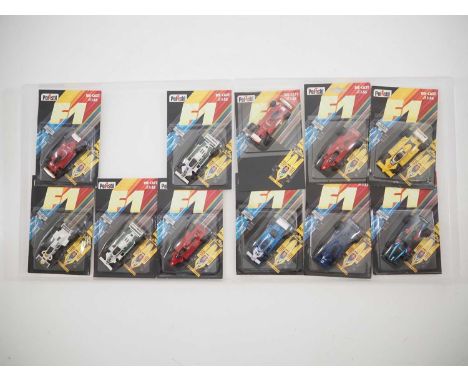 A group of POLISTIL diecast Formula 1 race cars from the 1:55 scale RN Series, sealed on original card backs - VG/E on G/VG c