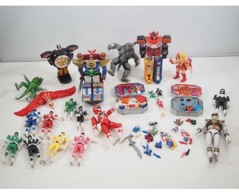 Power Rangers: A large quantity of Bandai Power Rangers action figures to include the Mighty Morphin Rangers with Flip Heads,