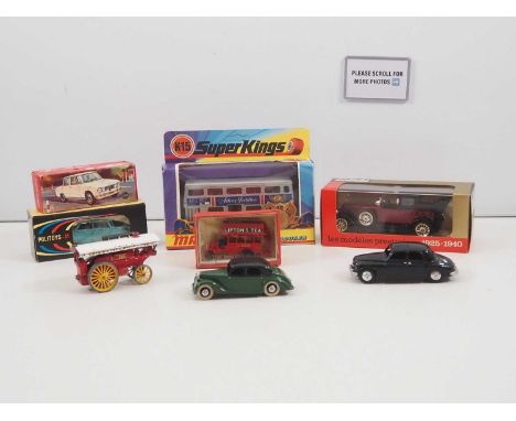 A mixed group of diecast vehicles comprising boxed examples by POLITOYS, MERCURY, SOLIDO and MATCHBOX together with some unbo
