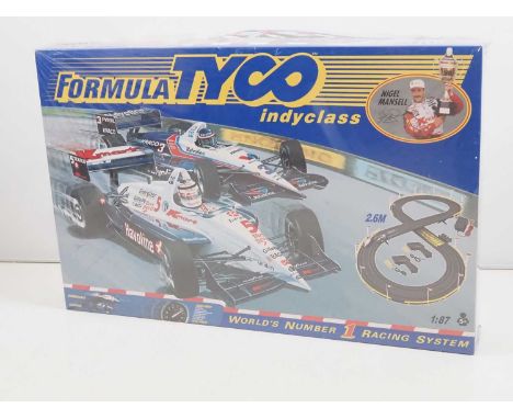 A TYCO TOYS Formula TYCO, Nigel Mansell, indyclass, 1:87 scale slot car racing set (1994), still in original packaging, seale