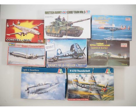 A group of unbuilt plastic aircraft kits and a tank kit in various scales by TAMIYA, ITALERI and others, unchecked but appear