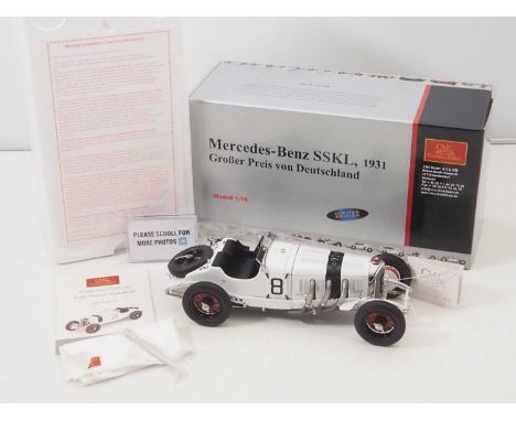 A CMC M-082 1/18 scale diecast Mercedes Benz SSKL 1931, GroBer Preis von Deutschland #8 1931 race car, with original tag and 
