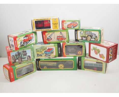 A group of KOVAP Czech made replica tinplate clockwork vehicles, mostly agricultural related, mostly circa 1:25 scale - VG/E 