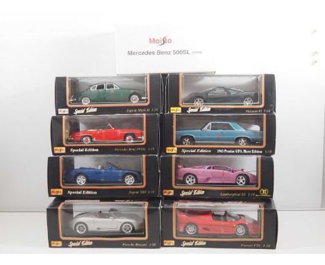 A group of MAISTO 1:18 scale diecast cars to include Mercedes, Jaguars etc - VG/E in VG boxes (9)