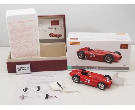 A CMC M-183 1/18 scale diecast 1956 Ferrari D50 race car, Italy GP J.M.Fangio / Peter Collins #26, with original tag, accesso