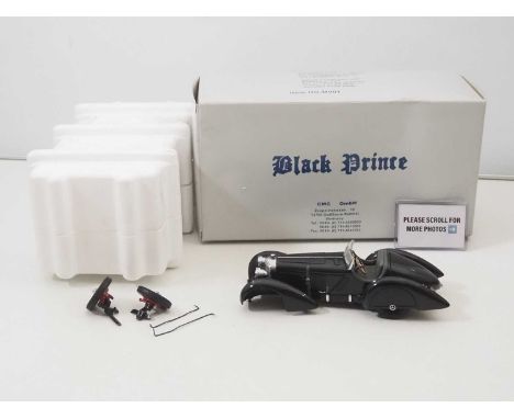 A CMC M-001 1/24 scale M-001 Mercedes Benz SSK 'Black Prince' diecast car, unfortunately with a broken steering rack (possibl