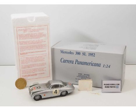 A CMC M-017 1/24 scale diecast Mercedes 300SL 1952 Carrera Panamericana race car in silver numbered 4, with original tag and 